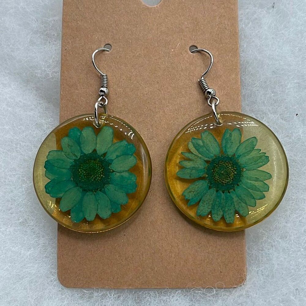 Artisan made dried dyed flower acrylic dangle earrings.